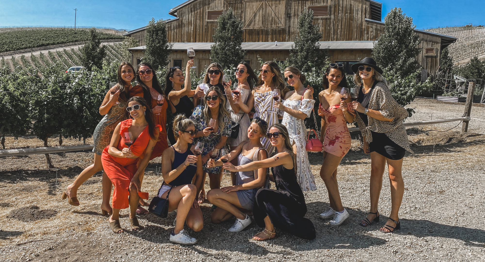 Wine tour group enjoying a vineyard outing with Jitney Shuttle transportation